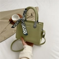 Mint green lychee pattern handbag with a decorative checkered scarf on woven handle - Green