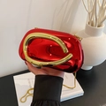 Glossy red hard shell clutch bag with gold C-handle and chain strap for evening events - Red
