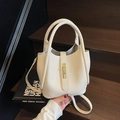 Borsa a secchiello bianco crema in pelle con manici tondi e chiusura a girello - Bianco Sporco