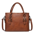 Vintage brown textured leather handbag for women with dual handles and shoulder strap - Brown