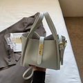 Light blue lychee pattern leather tote bag with gold buckle and adjustable strap - Blue
