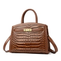 Elegant brown crocodile pattern handbag with gold clasp and top handle for women - Yellow