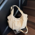 Bolso bandolera minimalista de nailon beige con diseño multibolsillos y correa ancha - Caqui