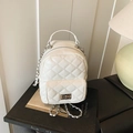Mini white quilted backpack in PU leather with silver metal chain and twist lock - White