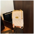 White quilted chain crossbody bag with gold tone hardware and decorative metal ball - White