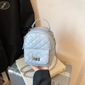 Mini light blue quilted backpack with metallic turn-lock and chain strap detail - Light Blue