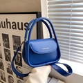 Minimalist royal blue trapezoid handbag made of matte PU leather for women - Blue
