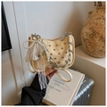 Studded cream woven handbag with silver chain and lace bow charm for women - Yellow