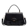 Chic black patchwork handbag with glossy leather and snake-print texture detail - Black