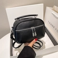 Minimalist black litchi pattern leather crossbody bag with dual silver zippers and handle - Black