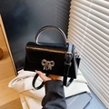 Retro black square crossbody bag with silver bow clasp and metallic handle for women - Coffee