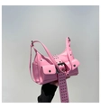 Detailed close-up of pink rivet baguette bag with silver buckles and multi-pockets - Pink