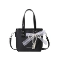 Black woven shoulder bag with white lace bow, pearl pendant and top handle design - Black