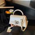 Minimalist cream white bow shoulder bag with silver handle and adjustable strap - White