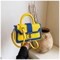 Modern yellow and blue color-block handbag with adjustable shoulder strap and metal clasp - Yellow
