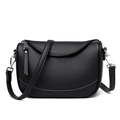 Minimalist black pebble leather half-moon shoulder bag with silver hardware and strap - Black