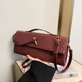 Retro burgundy woven leather baguette bag with a golden knot clasp for women - Burgundy