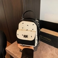 Zaino in pelle trapuntata bianco e nero con chiusura a scatto e tracolla a catena - Bianco