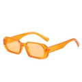 Vintage small oval sunglasses with translucent jelly orange frames and sleek temples - Orange Frame / Orange Lens