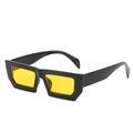 Retro square sunglasses with thick black frame and bright yellow lenses in a flat lay view - One Size / Black Frame Yellow Lens