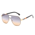 Golden aviator sunglasses with gradient lenses and striped temples on white background - One Size / Gold Frame Gray Brown Lens