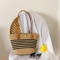 Straw tote bag with black stripes, leather handles, and a decorative pearl closure - Black Stripe Khaki