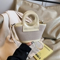 Schicke cremefarbene Web-Muscheltasche mit Lederbesatz und rundem Griff für Damen - Gelb