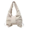 Quilted cream beige bow-shaped tote bag in puffy nylon fabric with adjustable strap - White