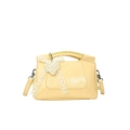 Pale yellow crossbody bag with woven handle, lace bow, and pearl heart charm - Yellow