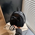 Mini black backpack for women featuring a large bow detail and adjustable straps - Black