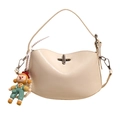 Chic cream-colored crossbody bag with wavy flap design and cute cartoon mascot charm - White (Without Charm)