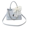 Light blue faux leather crossbody bag with white lace bow and silver chain detail - Blue