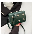Deep green quilted leather crossbody bag with silver studs and retro chic design - Green