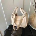 Chic beige lychee grain leather tote bag with unique double handles and snap button - Off White