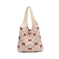 Knit shoulder bag in cream white featuring vibrant red bow patterns and thick woven straps - Beige Red