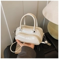 Chic beige crossbody bag in wrinkled faux leather with decorative zippers and top handle - Off White
