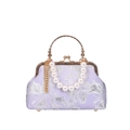 Lilac shell evening bag with silver floral embroidery, pearl handle, and gold kiss lock - Purple