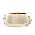Minimalist cream shoulder bag with beige woven panel and golden shell-shaped buckle - White