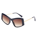 Lunettes de soleil géométriques oversize avec monture bleu foncé et branches dorées - Monture Noire Verres Thé