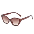 Classic cat-eye sunglasses with amber frame and brown gradient lenses in 45-degree view - Tea Frame Gradient Tea Lens
