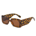 Square oversized tortoiseshell sunglasses with brown lenses on a white background - Leopard Frame / Tea Lens