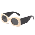 Occhiali da sole ovali retrò color crema con stanghette nere ondulate e lenti scure - Montatura Bianco Crema Lenti Grigie