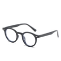 Lunettes de soleil rondes noires classiques avec rivets à double point et style rétro - Monture Noire Verres Transparents