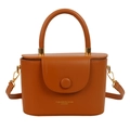 Structured orange leather top handle crossbody bag with gold fashion embossed lettering - Brown