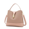 Pink crossbody handbag with woven texture and leather panels in a classic design - Pink