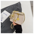 Beige crocodile embossed box bag with gold chain strap and floral pendant detail - Off White
