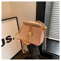 Pink crocodile pattern mini bucket bag with gold chain strap and floral metal clasp - Pink