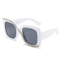Square white sunglasses with grey lenses and vertical S-shaped rhinestone detailing - White Frame Gray Lens