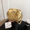 Yellow quilted chain shoulder bag with silver turn-lock closure and dual straps - Yellow