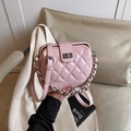 Chic pink quilted handbag with silver chain strap and metal turn-lock closure - Pink